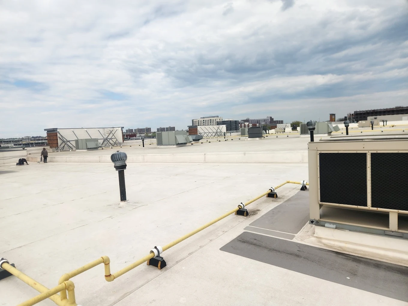 Roofing contractor in Bay Shore NY — commercial flat roof installation on a Long Island business property